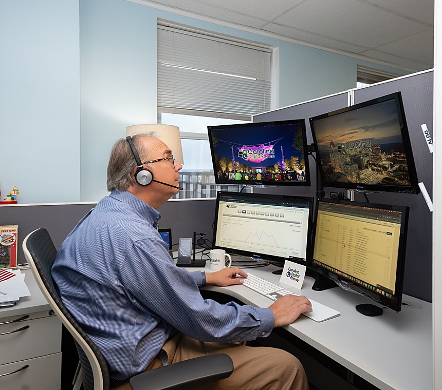 A pre-sales engineer reviewing a call flow with a customer