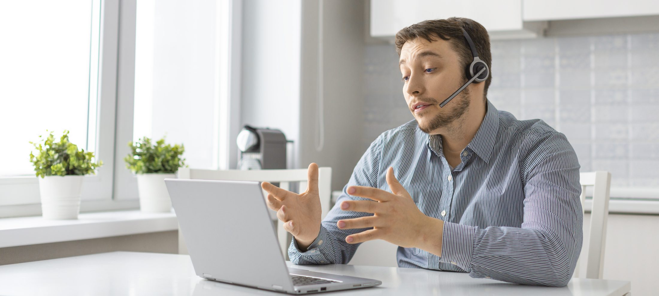 A modern office team using a hosted VoIP business phone system